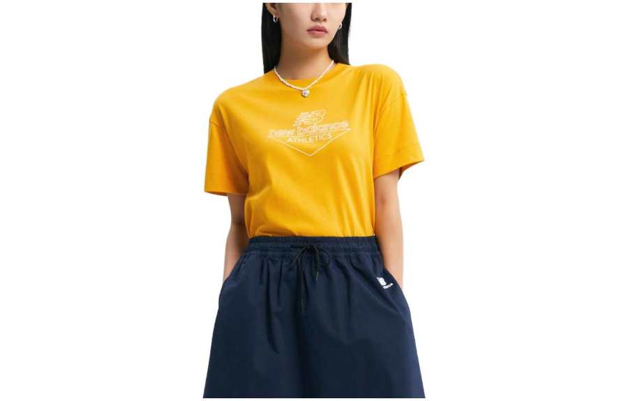 New Balance New Balance T Shirts Women's Yellow Crew Neck Moderate Straight Fit