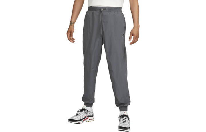 Nike Nike SPORTSWEAR TECH PACK Sports Pants Men's Gray Moderate