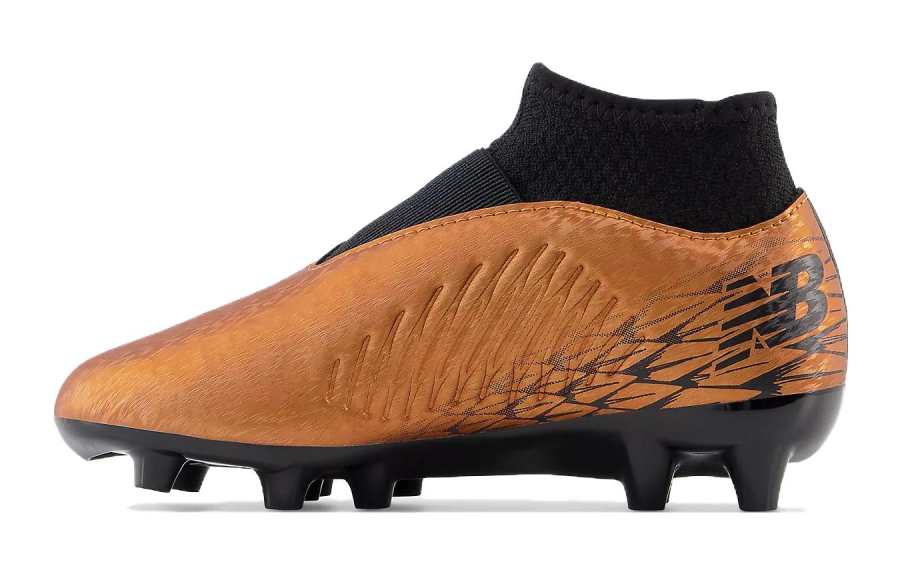 New Balance New Balance Tekela V4 Magique Junior FG Low top Kids' Soccer Shoes Copper & Black Kids'