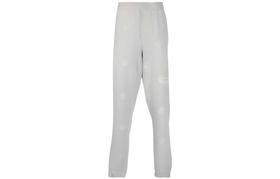 Martine Rose all-over logo-print track pants